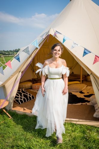 Festival wedding photo shoot, bride in boho wedding dress and our 7m chill out bell