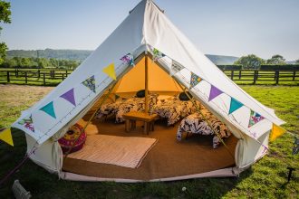 5m cream bell tent with camp beds and memory foam toppers