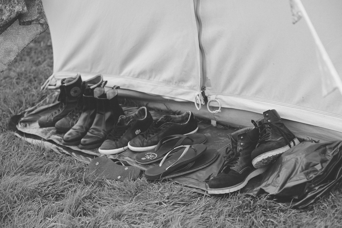 Shoes outside door of bell tent after the party. Bell tent hire for events and weddings.