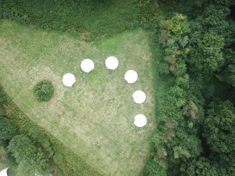 Drone shot of a wedding guest village at Two Woods wedding venue in Pulborough