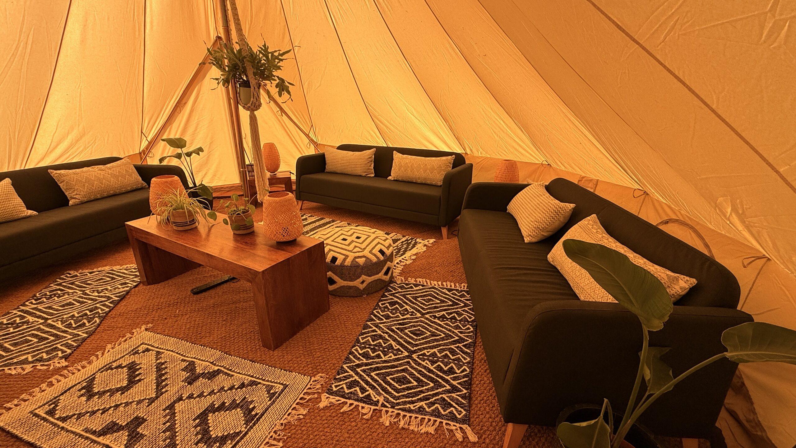 Internal photo of the chill out bell tent in The Den, at Hen Camp