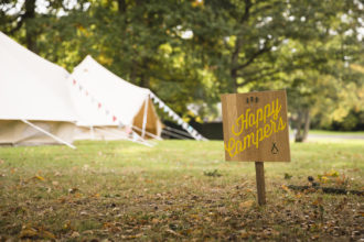 Beautiful Bells glamping village and happy camper sign