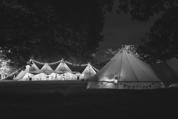 Black and white picture of bell tent and Kata Tipis for outdoor weddings in West Sussex, Hampshire and Surrey