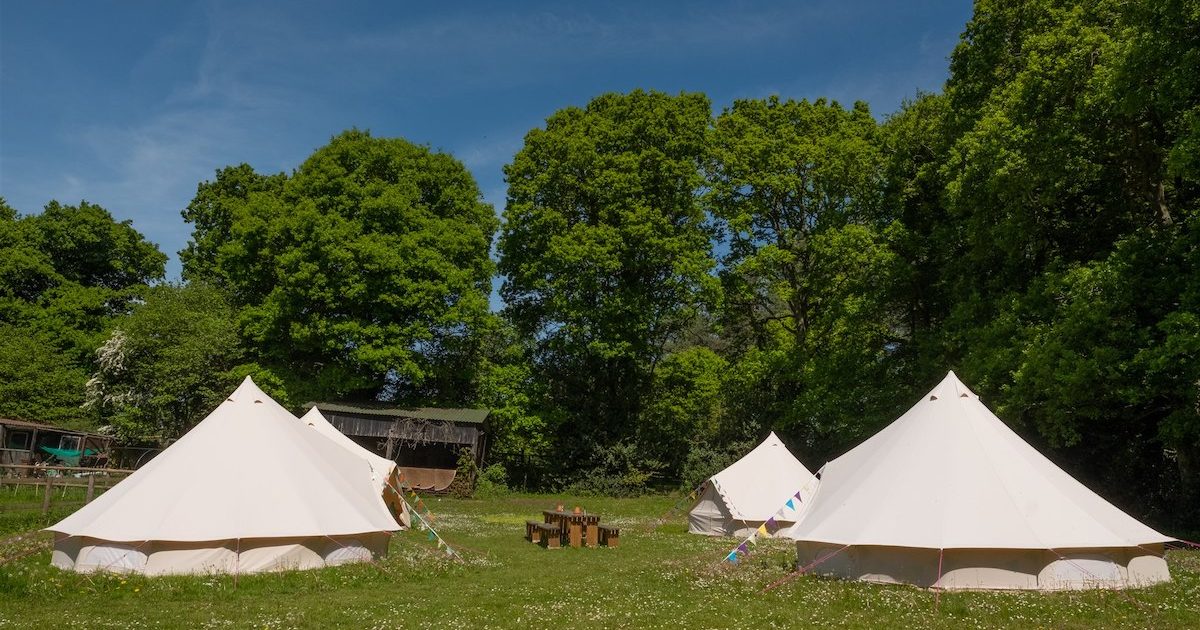 Beautiful Bells May 2019 Showing the Tribe hen camp area at Hillside hen camp. Luxury glamping for hen parties.