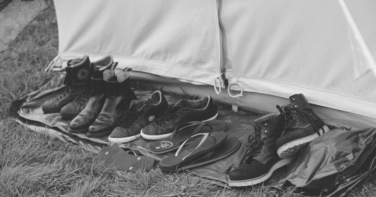 Bell Tent Hire For Events In Hampshire Shoes outside door of bell tent after the party. Bell tent hire for events and weddings.