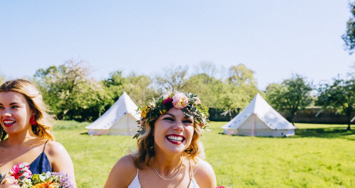 Bride stood infant of bell tent village